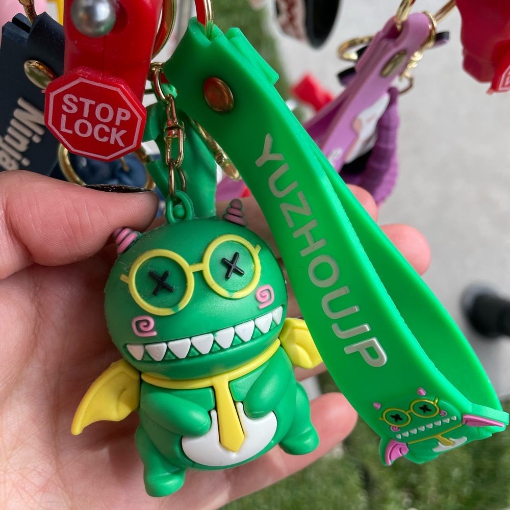 Green Monster Keychain with Yellow Wings
